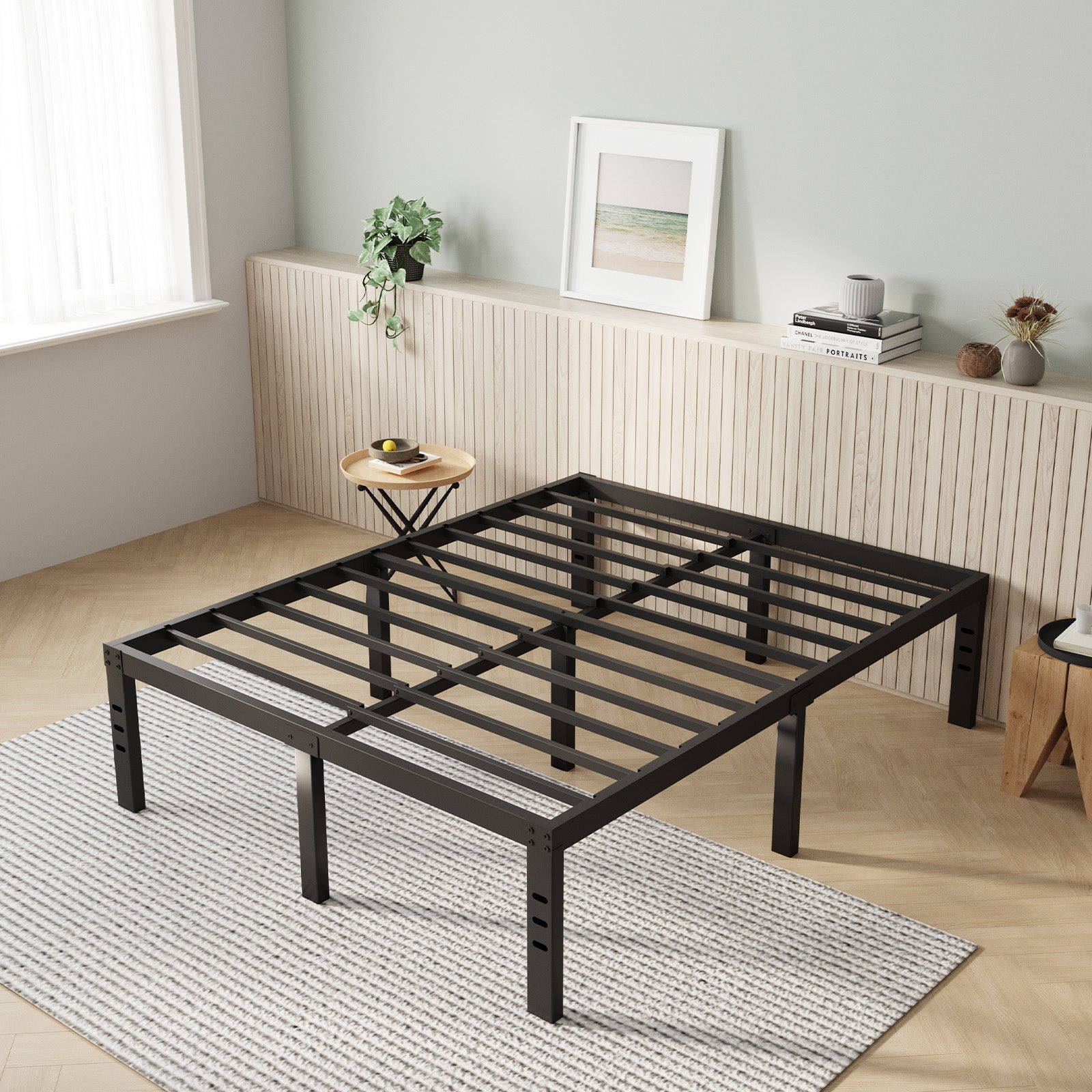 Vantor black metal bed frame with slatted platform and adjustable legs on striped rug.