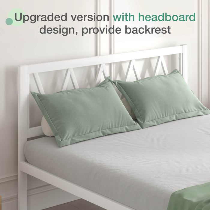 Bliss Comfort Backrest Bundle: white wooden bed frame with criss-cross headboard and sage green pillows.
