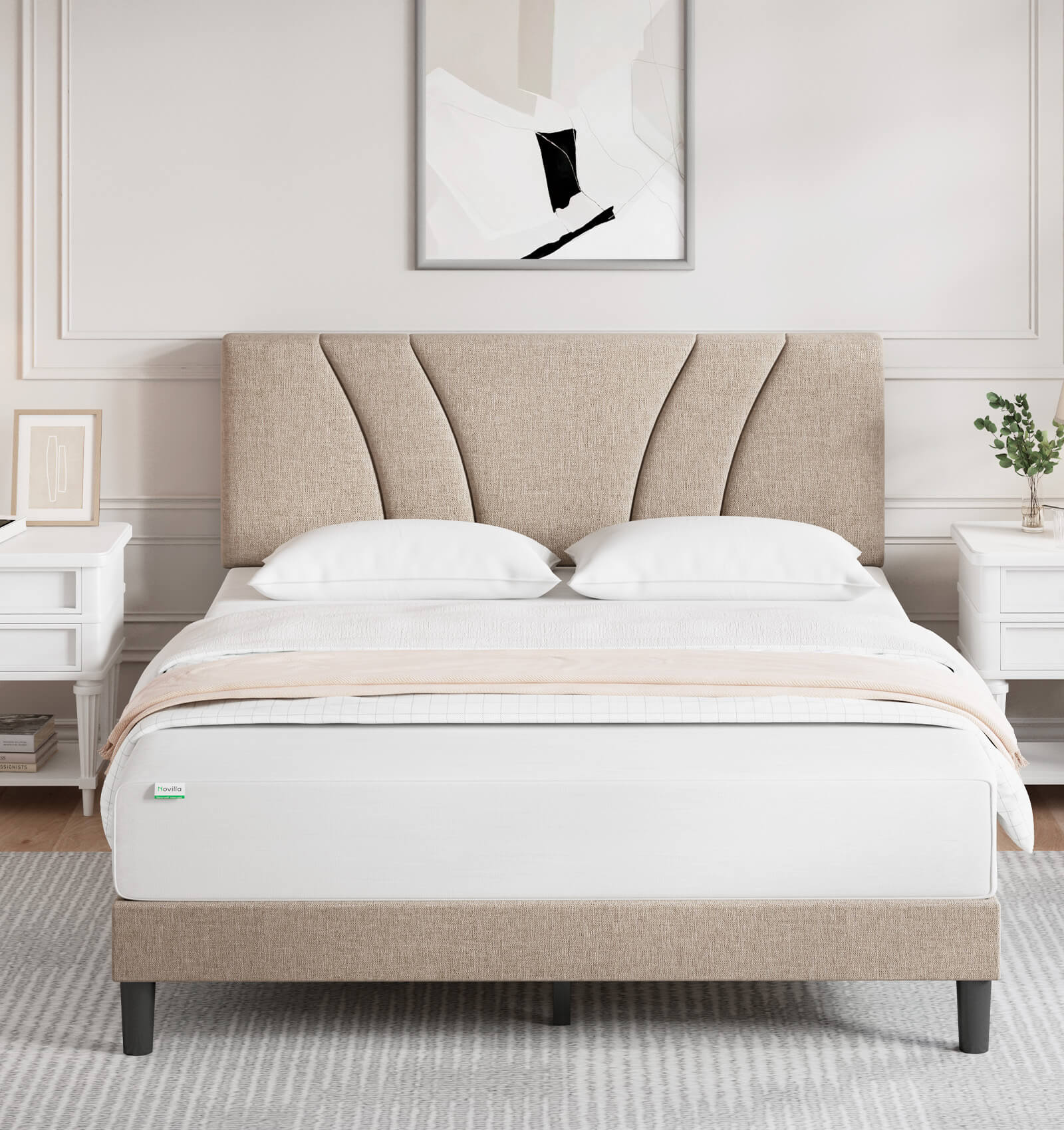 Classic Luxe beige upholstered bed frame with adjustable geometric headboard, styled with white bedding on a grey rug.