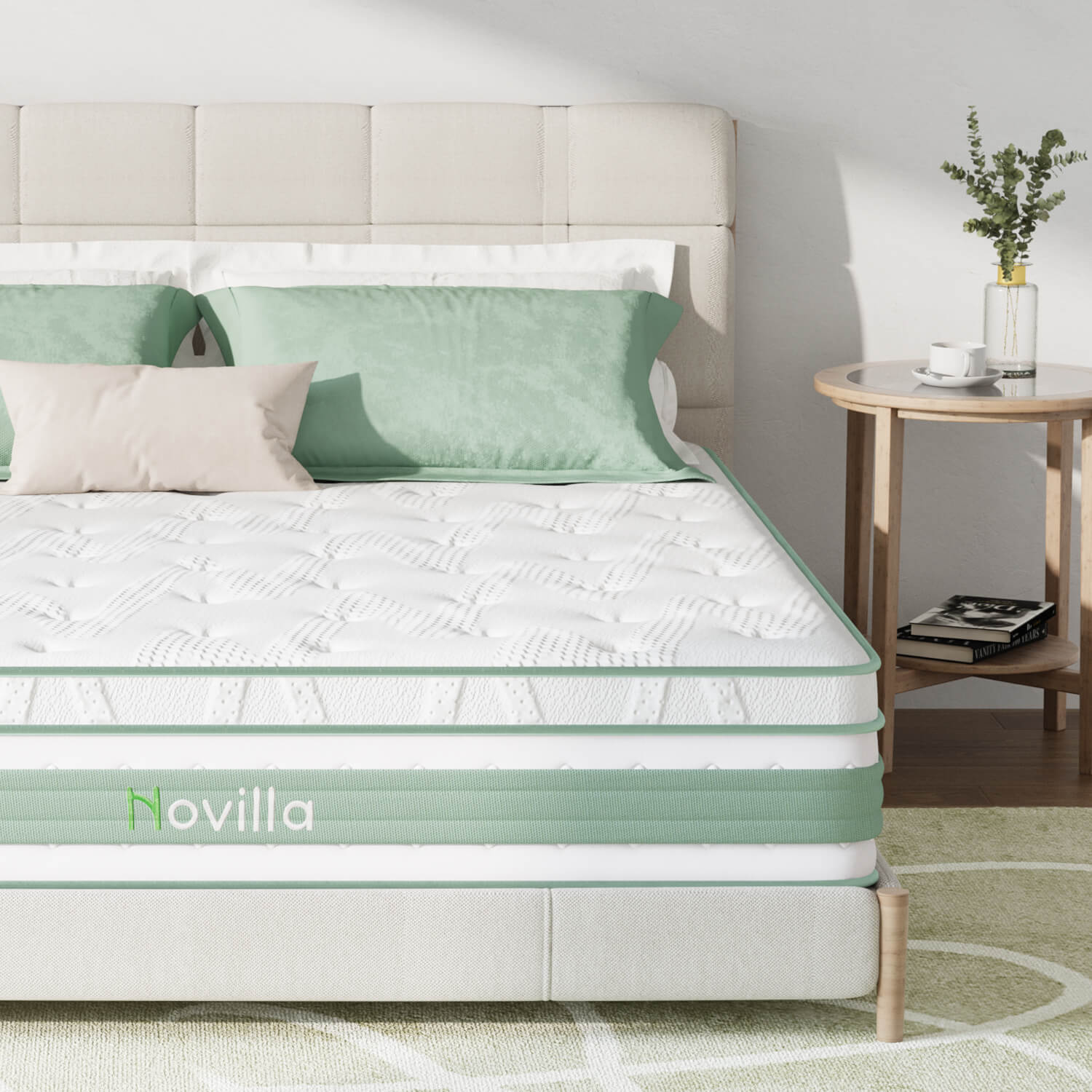Buoyant Hybrid Mattress by Novilla with white and green design on a bed with mint green pillows.