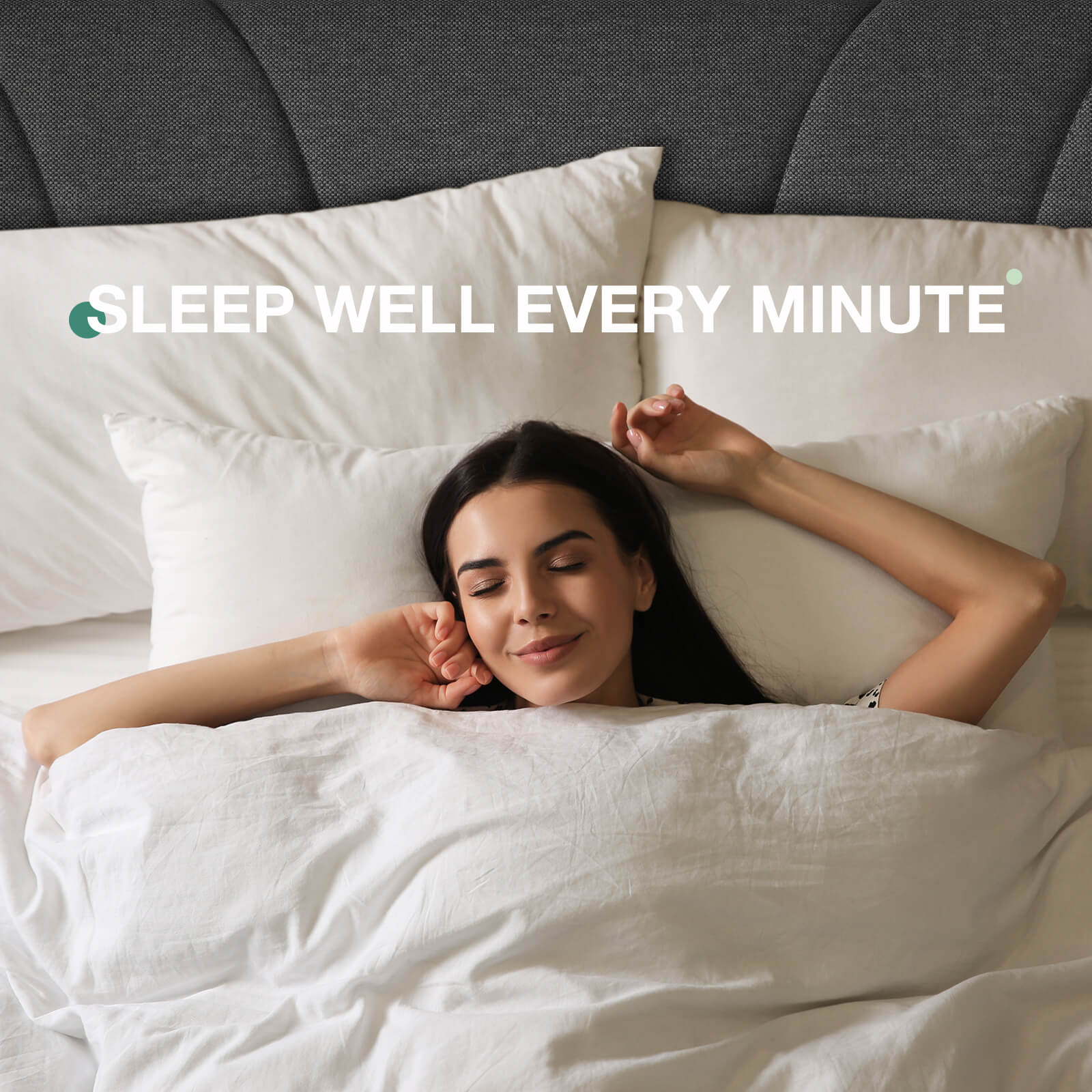 Woman sleeping peacefully on Classic Luxe dark gray upholstered bed frame with plush white bedding.