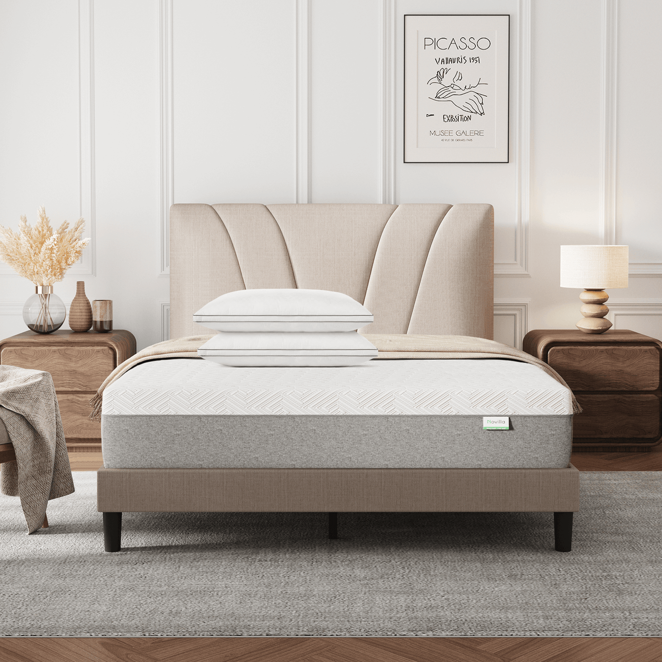 Bliss Adjustable Sleep Bundle with white textured mattress, two pillows, and beige curved headboard on taupe bed frame.